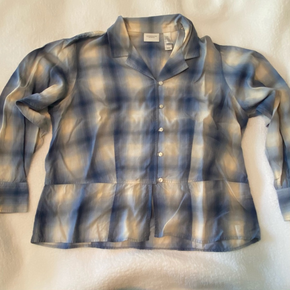 Blue and white button down blouse.